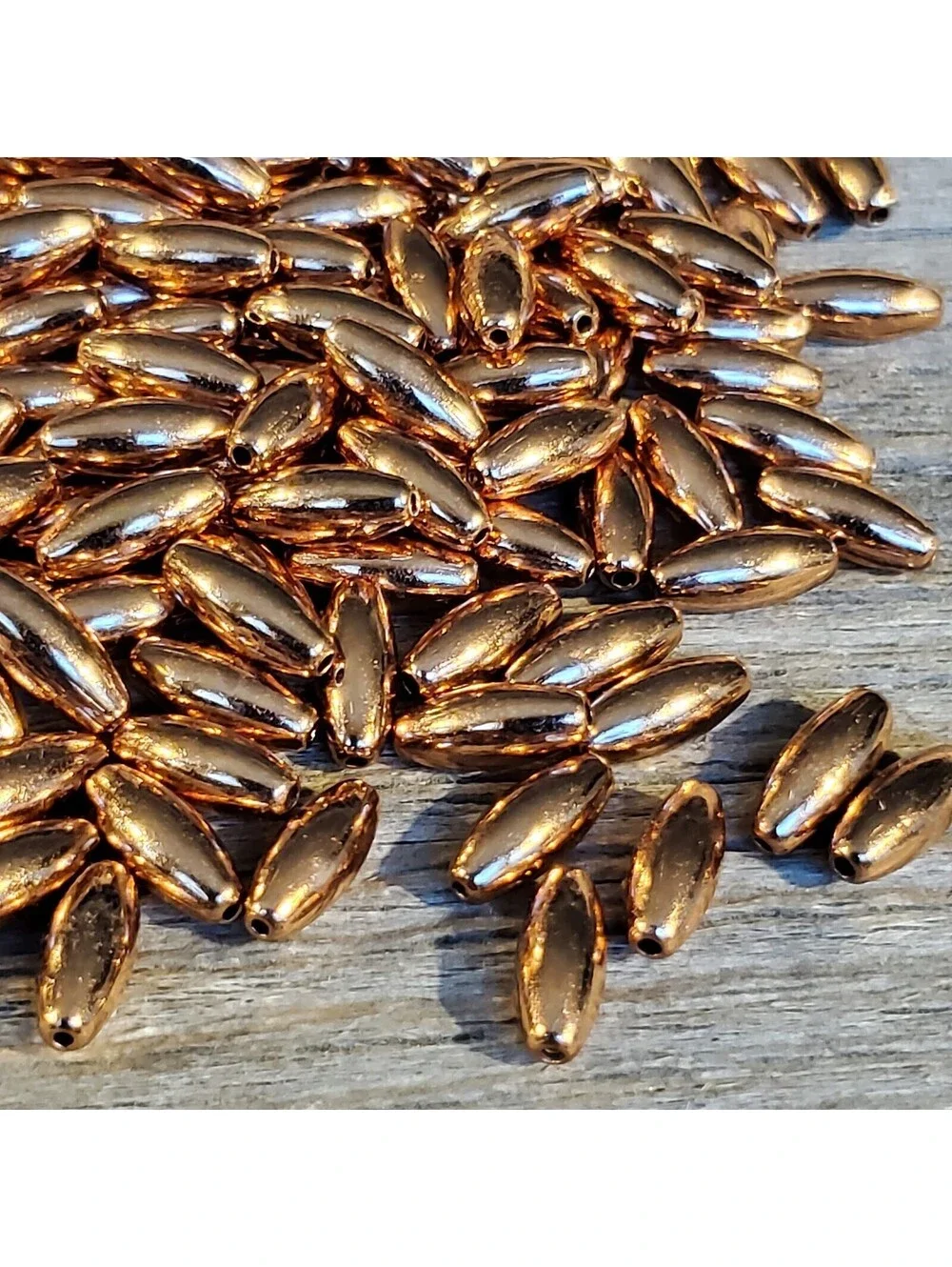 Bulk Pack of 50 Solid India Shiny Copper 9x4mm Smooth Oval Spacer Beads